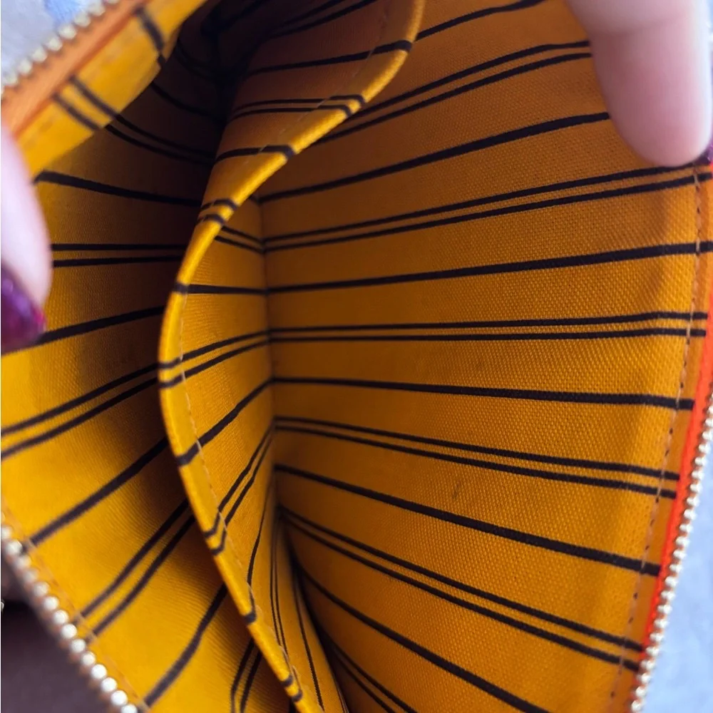 Authentic Louis Vuitton mimosa yellow lining Neverfull GM pouch wristlet
